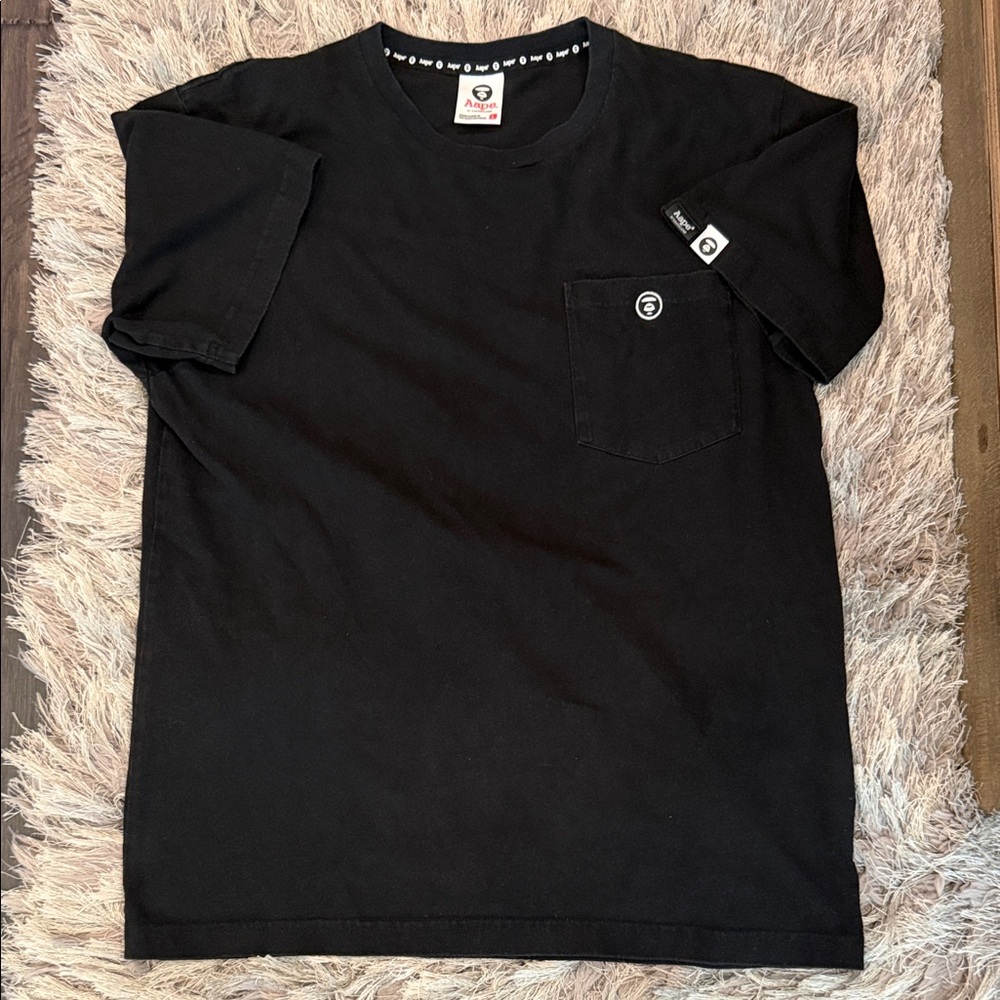 Black Short-Sleeve Pocket Tee with Subtle Patch Logo